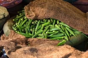 Pile of fresh okra for sale in market